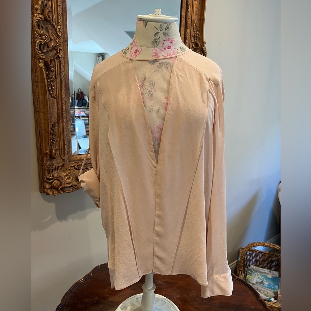 Blush color over blouse